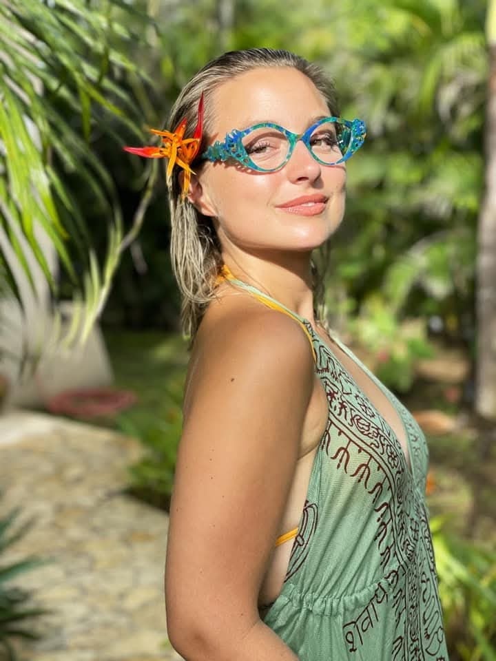 Sculptural ocean-inspired cat-eye frames outdoors